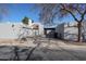 Contemporary-style home with a private courtyard and stucco walls showcasing clean architectural lines at 2113 N Squire Ave, Tempe, AZ 85288