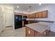 Bright kitchen with stainless steel appliances and a center island at 2260 S Deerfield Ln, Gilbert, AZ 85295