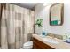 Well-lit bathroom with a granite countertop and bronze faucet offers ample storage at 2302 E Sells Dr, Phoenix, AZ 85016