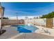 Inviting pool area with a waterfall feature provides a serene and relaxing backyard oasis at 2302 E Sells Dr, Phoenix, AZ 85016