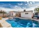 Refreshing pool offers a perfect spot to cool off during the summer, with a well-maintained yard at 2302 E Sells Dr, Phoenix, AZ 85016