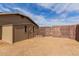 A private backyard with a shed and a wooden fence at 2643 E Jerome Ave, Mesa, AZ 85204