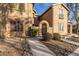 Charming exterior view of a home with a stone-accented entrance and well-maintained landscaping at 28735 N 21St Ave, Phoenix, AZ 85085