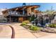 Stunning exterior view of a community center with a waterfall and outdoor seating area at 28735 N 21St Ave, Phoenix, AZ 85085