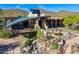 Spectacular building with a waterfall feature and lounge area overlooking the desert landscape at 28735 N 21St Ave, Phoenix, AZ 85085