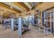 Community gym featuring ample fitness equipment, exposed ductwork, and expansive windows at 28735 N 21St Ave, Phoenix, AZ 85085