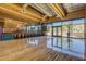 Community gym featuring hardwood floors, ample windows, exposed ductwork, and fitness equipment at 28735 N 21St Ave, Phoenix, AZ 85085