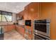 Kitchen space featuring stainless steel appliances, granite countertops, and ample cabinet storage at 28735 N 21St Ave, Phoenix, AZ 85085