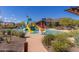 Gathering-friendly pool with a water park, slides, and a lounging area at 28735 N 21St Ave, Phoenix, AZ 85085