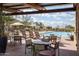 Inviting pool area with ample seating, tables, and shade umbrellas at 28735 N 21St Ave, Phoenix, AZ 85085