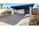 Well-maintained carport with ample parking space, complemented by drought-tolerant landscaping at 3133 W Christy Dr, Phoenix, AZ 85029