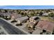 Picturesque aerial view of homes with well-manicured lawns in a friendly and inviting neighborhood at 3238 W White Canyon Rd, San Tan Valley, AZ 85144