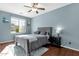 Serene bedroom featuring a full size bed with gray accents and a ceiling fan at 3238 W White Canyon Rd, San Tan Valley, AZ 85144