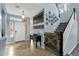 Light and bright foyer with a staircase, console table, and tile flooring at 3238 W White Canyon Rd, San Tan Valley, AZ 85144