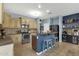 Inviting kitchen with light cabinetry, stainless steel appliances, and a convenient breakfast bar at 3238 W White Canyon Rd, San Tan Valley, AZ 85144