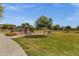 This community playground offers play equipment and a covered picnic area for families to enjoy at 3238 W White Canyon Rd, San Tan Valley, AZ 85144