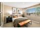 Serene bedroom with large windows, neutral colors, and contemporary furnishings at 3255 E Baler Dr, San Tan Valley, AZ 85140