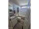 Bathroom featuring gray countertops, stylish vanity, and a shower and tub combination at 329 N 83 Pl, Mesa, AZ 85207