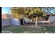 A mature tree, storage shed, and partial turf makes this backyard very charming at 3527 W Almeria Rd, Phoenix, AZ 85009