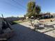 Spacious backyard with stone pavers and grass area at 3527 W Almeria Rd, Phoenix, AZ 85009