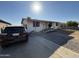 Exterior front view of single story home with black Jeep in driveway at 3527 W Almeria Rd, Phoenix, AZ 85009