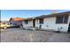 Modest single-story home features a desert-style front yard, and a covered porch at 3527 W Almeria Rd, Phoenix, AZ 85009