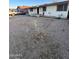 Front yard featuring gravel landscaping, single story home, and mature plants at 3527 W Almeria Rd, Phoenix, AZ 85009