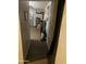 Hallway with a view of the home's interior, showcasing wood-look floors and neutral wall colors at 3527 W Almeria Rd, Phoenix, AZ 85009