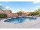 Gorgeous backyard pool with a water feature and plenty of space for lounge chairs in this single Gathering home at 4272 E Ivanhoe St, Gilbert, AZ 85295