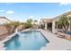 Relaxing backyard pool with a water feature and hot tub with mature landscaping perfect for relaxing in this single Gathering home at 4272 E Ivanhoe St, Gilbert, AZ 85295