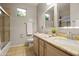 Bathroom featuring double sinks, granite counters, and shower/tub combo at 4272 E Ivanhoe St, Gilbert, AZ 85295