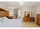 Bright main bedroom showcasing a bed and large dresser and mirror at 4272 E Ivanhoe St, Gilbert, AZ 85295