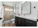 Stylish bathroom features a glass shower, modern vanity, and gold hardware at 441 S Dodge Dr, Chandler, AZ 85225