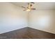 Bedroom with a ceiling fan and light fixture and natural light from the window at 4517 N 123Rd Dr, Avondale, AZ 85392