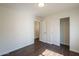 Bedroom with a view of a closet with sliding doors and access to a hallway at 4517 N 123Rd Dr, Avondale, AZ 85392