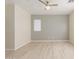 Spacious bedroom with a ceiling fan, neutral paint, light-colored wood floors and one window at 45341 W Paraiso Ln, Maricopa, AZ 85139