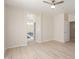 Bedroom with attached bath, ceiling fan, and neutral paint at 45341 W Paraiso Ln, Maricopa, AZ 85139