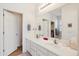 Bright bathroom with double sink vanity, large mirror, and ample storage space at 4627 E Sourwood Dr, Gilbert, AZ 85298