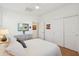 Bedroom with neutral decor, ensuite bath, ceiling fan and white doors at 4627 E Sourwood Dr, Gilbert, AZ 85298