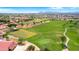 Expansive golf course with lush green fairways, mature trees, and mountain views at 4627 E Sourwood Dr, Gilbert, AZ 85298