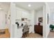 This home office features built in cabinets, desk and natural light at 4627 E Sourwood Dr, Gilbert, AZ 85298