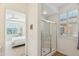 Shower stall with glass door and shuttered window next to main bedroom at 4627 E Sourwood Dr, Gilbert, AZ 85298