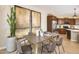 Dining room with modern decor adjacent to the kitchen featuring stainless steel appliances at 4752 E Topaz Dr, San Tan Valley, AZ 85140