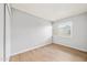 Bright, empty bedroom with natural light and ample space, showcasing the neutral color palette at 4867 W Palo Verde Dr, Glendale, AZ 85301