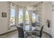 Bright dining area with backyard views from a large window at 4915 N Greentree Dr, Litchfield Park, AZ 85340