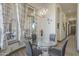 Dining area with modern chandelier and sliding glass doors providing backyard views at 4915 N Greentree Dr, Litchfield Park, AZ 85340