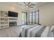 This spacious main bedroom is bright and airy with large bay windows at 4915 N Greentree Dr, Litchfield Park, AZ 85340