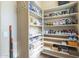 Bright walk-in closet featuring custom shelving for shoes, bags and other essentials at 4915 N Greentree Dr, Litchfield Park, AZ 85340