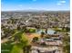 Aerial view of Glendale home near a scenic golf course and lake community at 4939 W Joyce Cir, Glendale, AZ 85308