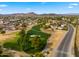 Scenic aerial view of the community golf course near homes in a quiet neighborhood at 4939 W Joyce Cir, Glendale, AZ 85308